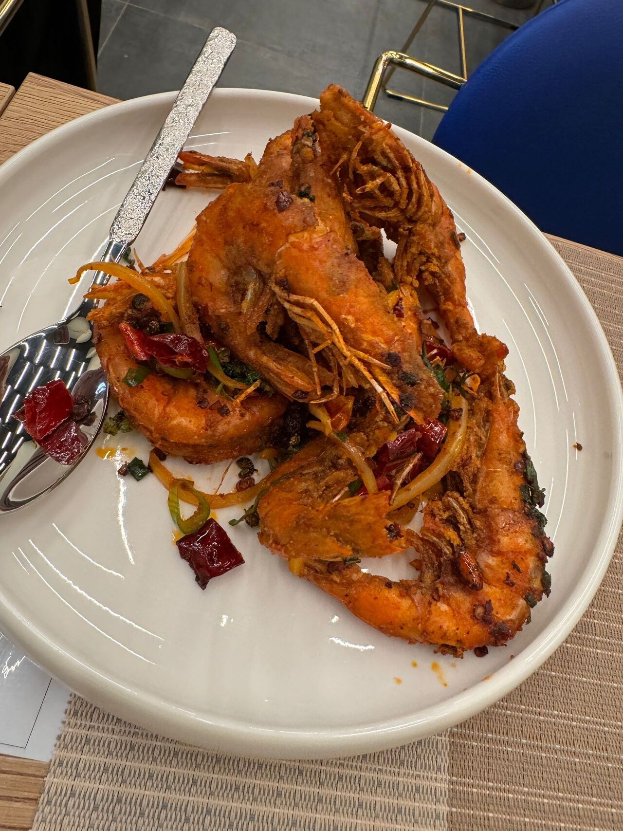 Fried prawns in a spiced crust with dried chillies.